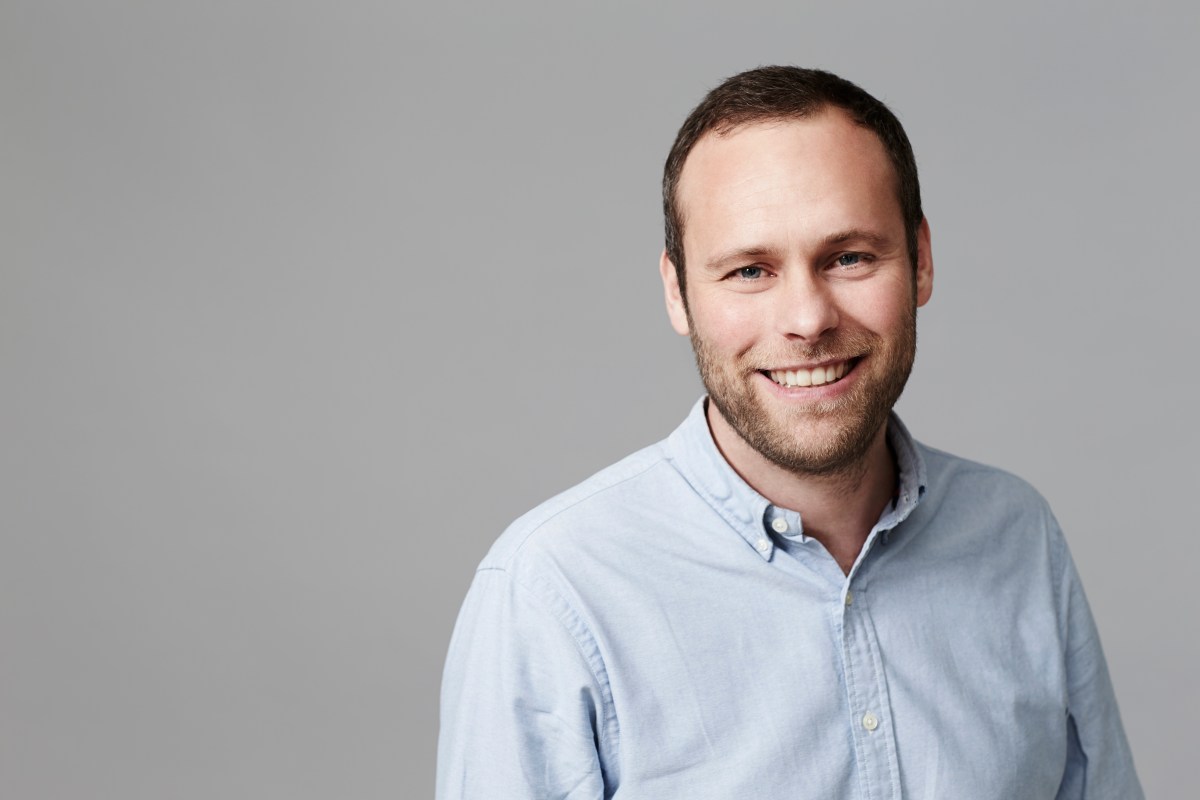 James Morrison (Mid adult man) smiling in studio