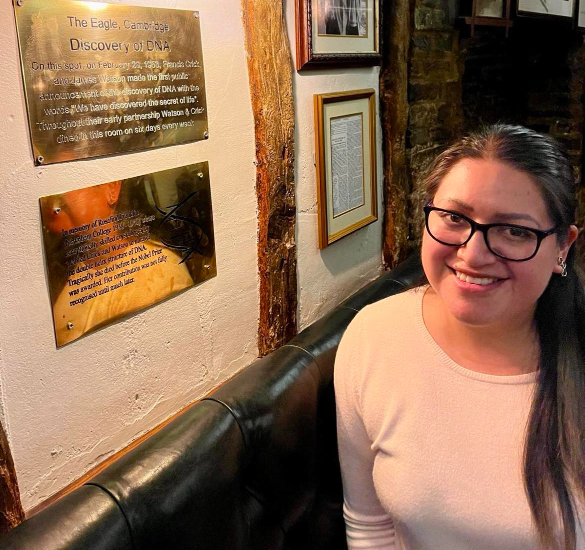 Sharon posing at the Eagle Pub (Cambridge, UK) next to the spot where Watson and Crick made the first public announcement of the discovery of DNA.